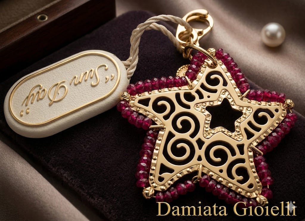 Charm stella donna Sun Day in oro giallo e spinelli rossi 2150/102/6