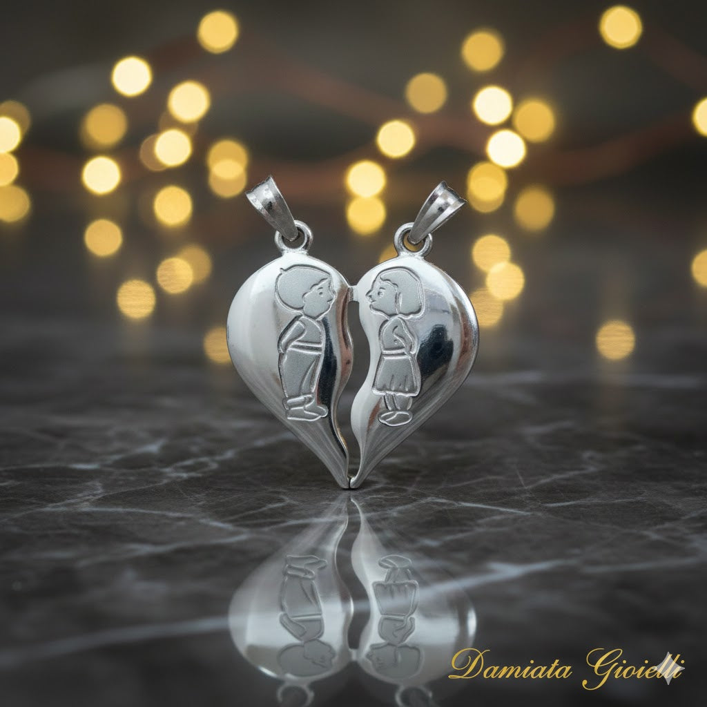 Ciondolo cuore che si spezza donna in oro bianco 323/102/3