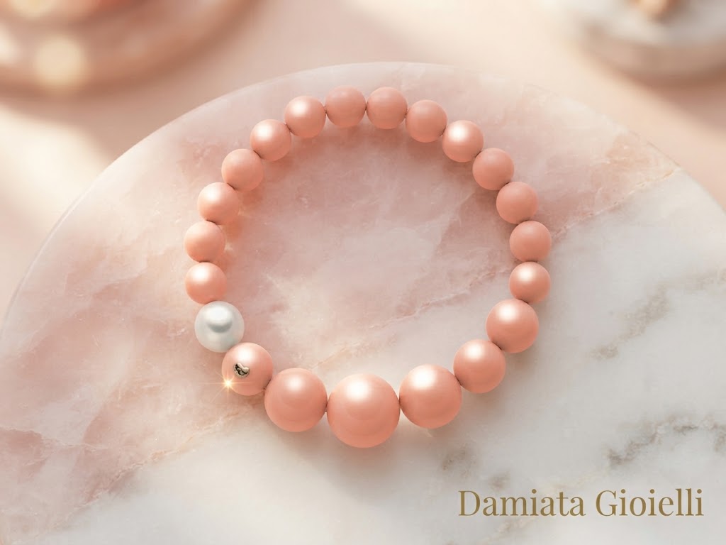 Bracciale elastico degradè donna Miluna con corallo rosa e perla ref. PBR2392