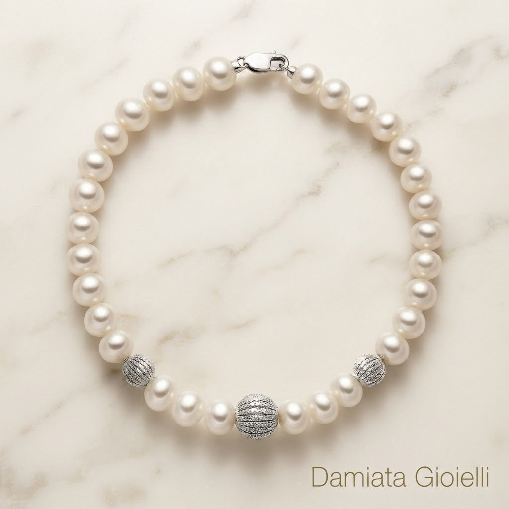 Bracciale filo di perle donna Miluna in oro bianco con tre boule ref. PBR2536V
