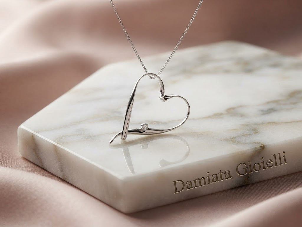 Collana con cuore donna Orelù in oro bianco e diamante di 0,008 carati ref. AU270MAN